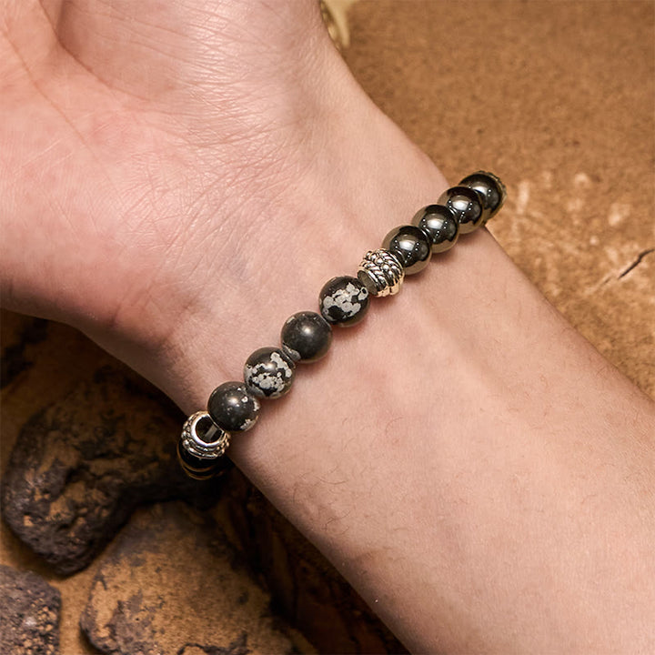 Pulsera para hombre con cuentas de hematita y obsidiana copo de nieve de Olivenorma