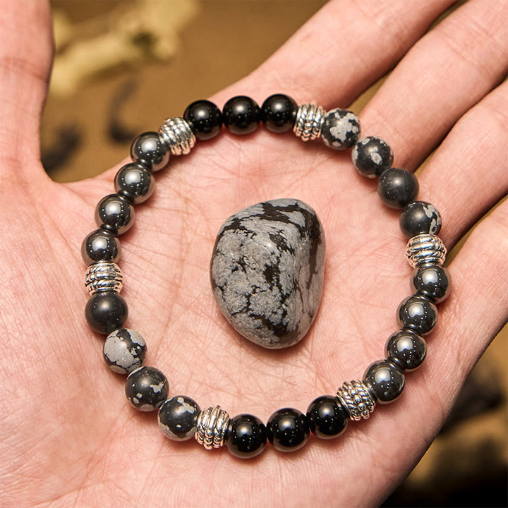Pulsera para hombre con cuentas de hematita y obsidiana copo de nieve de Olivenorma
