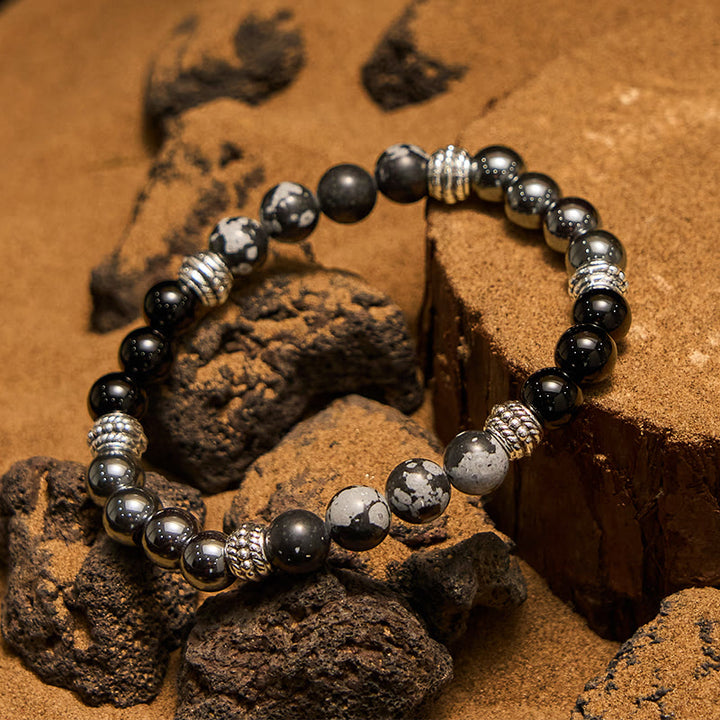 Pulsera para hombre con cuentas de hematita y obsidiana copo de nieve de Olivenorma