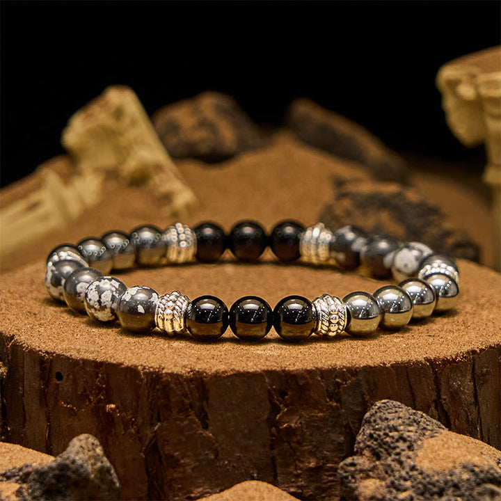Pulsera para hombre con cuentas de hematita y obsidiana copo de nieve de Olivenorma