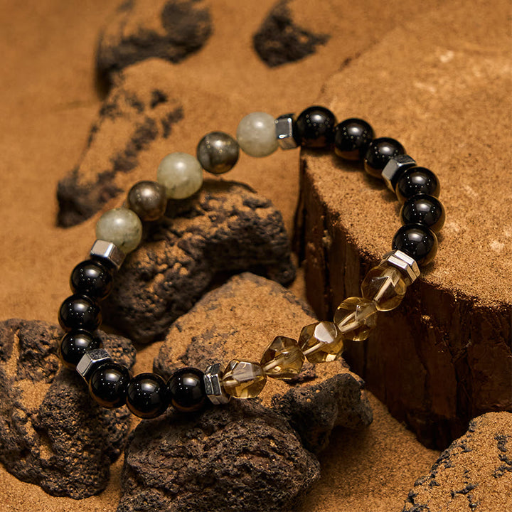 Pulsera de cuentas de obsidiana labradorita y cuarzo ahumado de Olivenorma