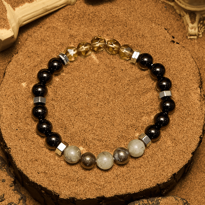 Pulsera de cuentas de obsidiana labradorita y cuarzo ahumado de Olivenorma