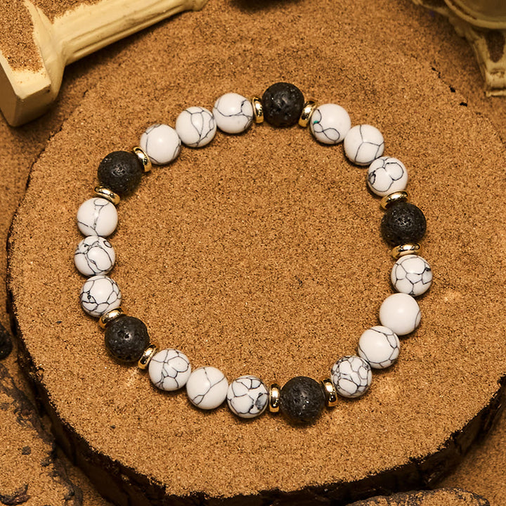 Pulsera de cuentas de turquesa blanca y piedra volcánica natural Olivenorma