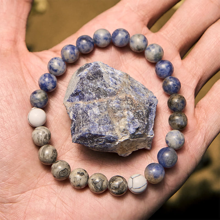 Pulsera de cuentas de jaspe gris y sodalita azul natural de Olivenorma