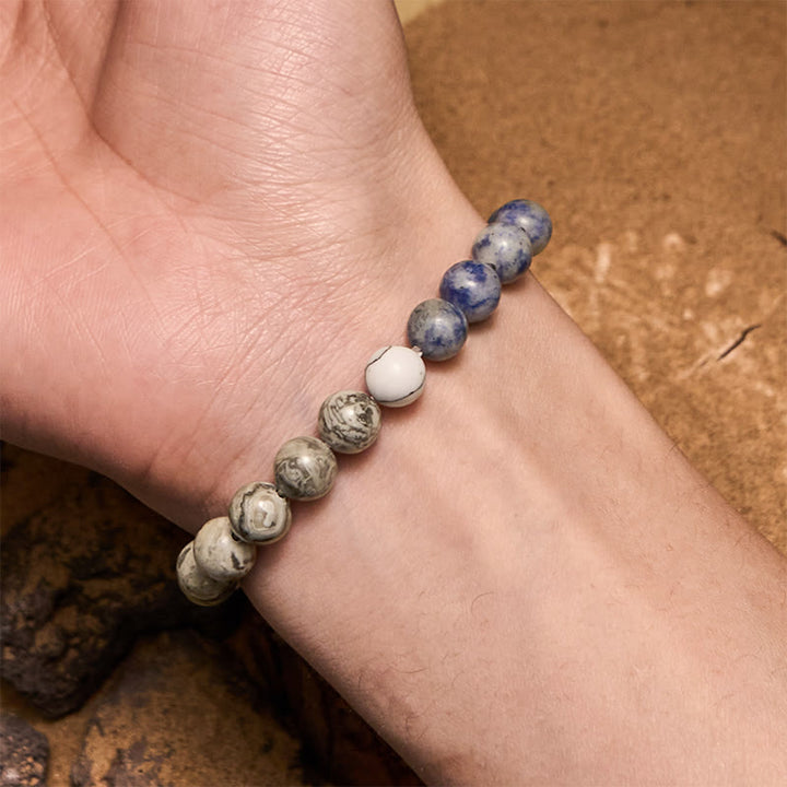 Pulsera de cuentas de jaspe gris y sodalita azul natural de Olivenorma