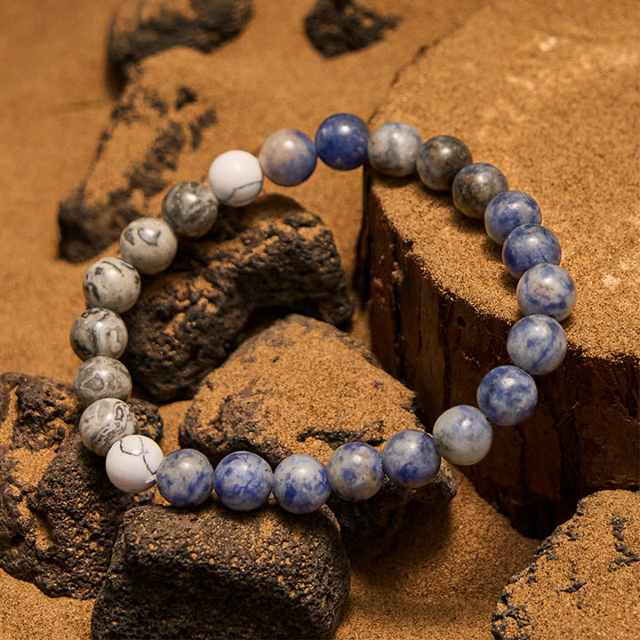 Pulsera de cuentas de jaspe gris y sodalita azul natural de Olivenorma
