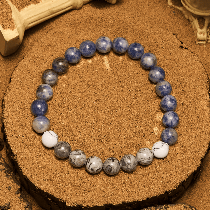 Pulsera de cuentas de jaspe gris y sodalita azul natural de Olivenorma