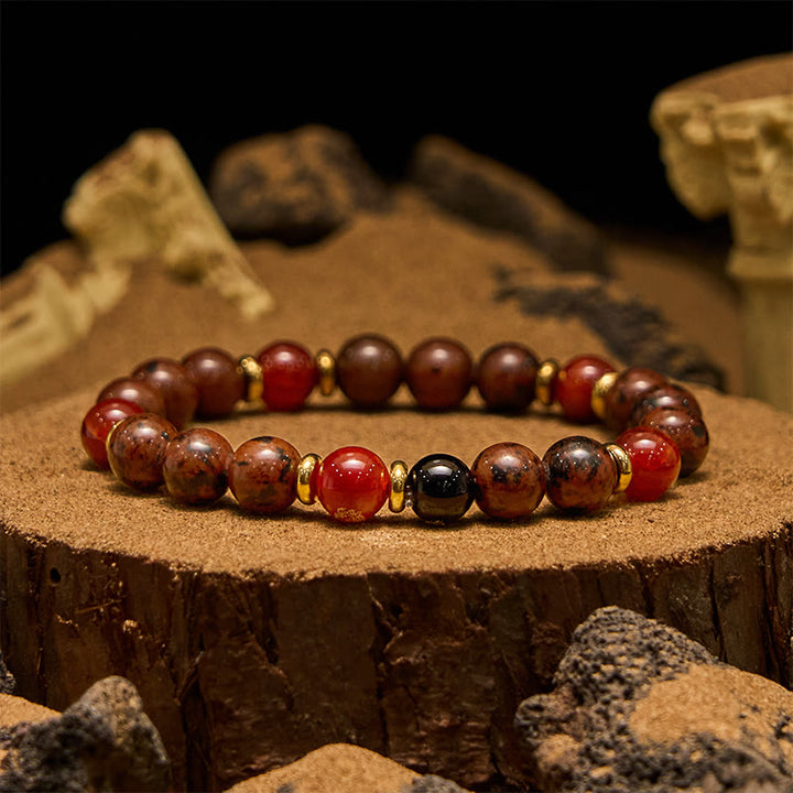 Pulsera Olivenorma de cuentas de caoba natural, obsidiana y coral rojo