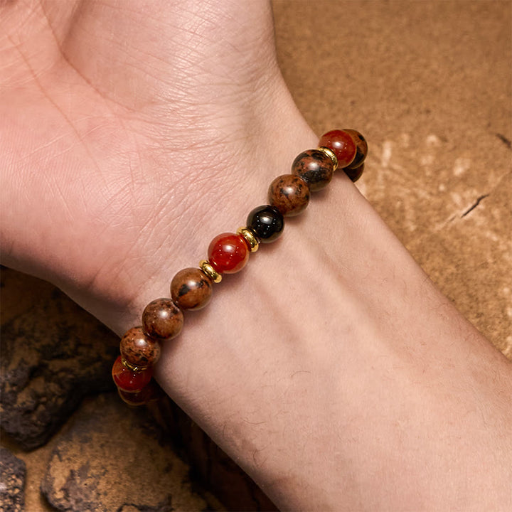 Pulsera Olivenorma de cuentas de caoba natural, obsidiana y coral rojo