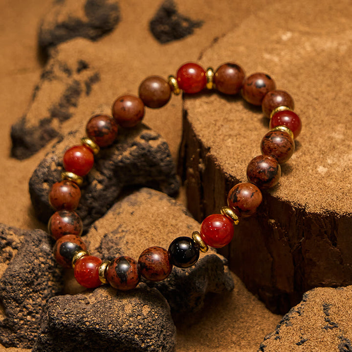 Pulsera Olivenorma de cuentas de caoba natural, obsidiana y coral rojo