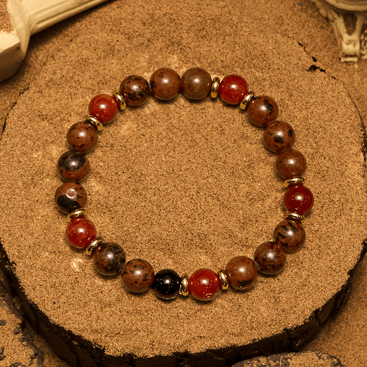 Pulsera Olivenorma de cuentas de caoba natural, obsidiana y coral rojo