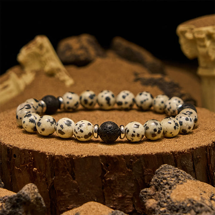 Pulsera de cuentas de piedra de lava de jaspe dálmata natural de Olivenorma