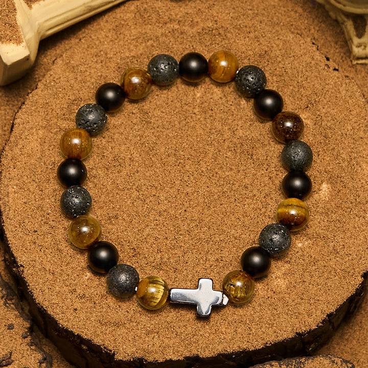 Pulsera cruzada con cuentas de lava y ojo de tigre de Olivenorma