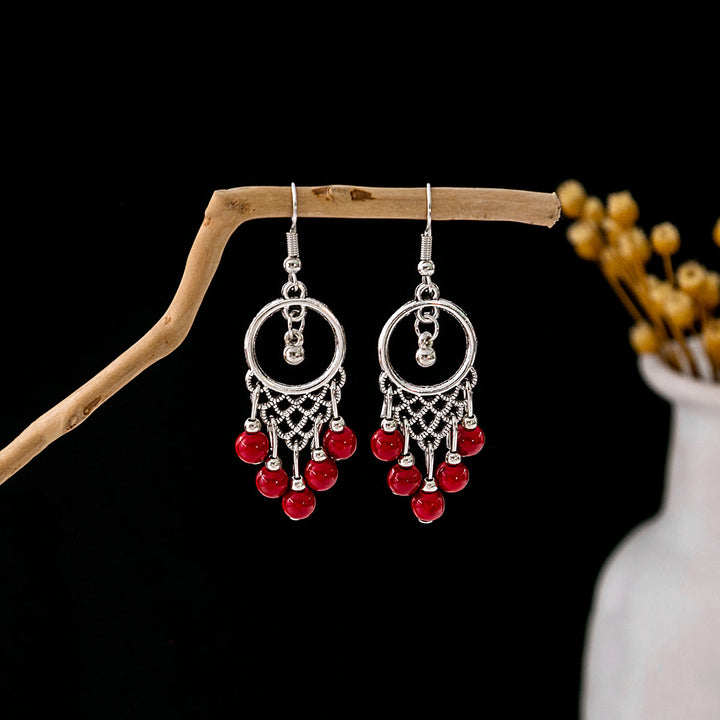 Pendientes Olivenorma estilo étnico retro con borlas bohemias de turquesa