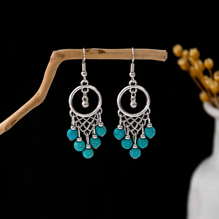 Pendientes Olivenorma estilo étnico retro con borlas bohemias de turquesa