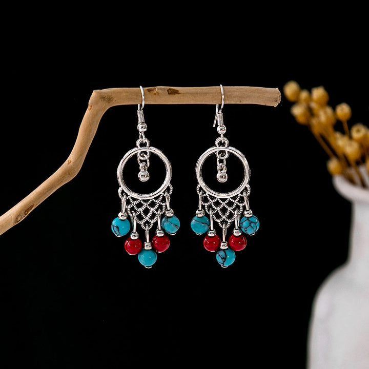Pendientes Olivenorma estilo étnico retro con borlas bohemias de turquesa