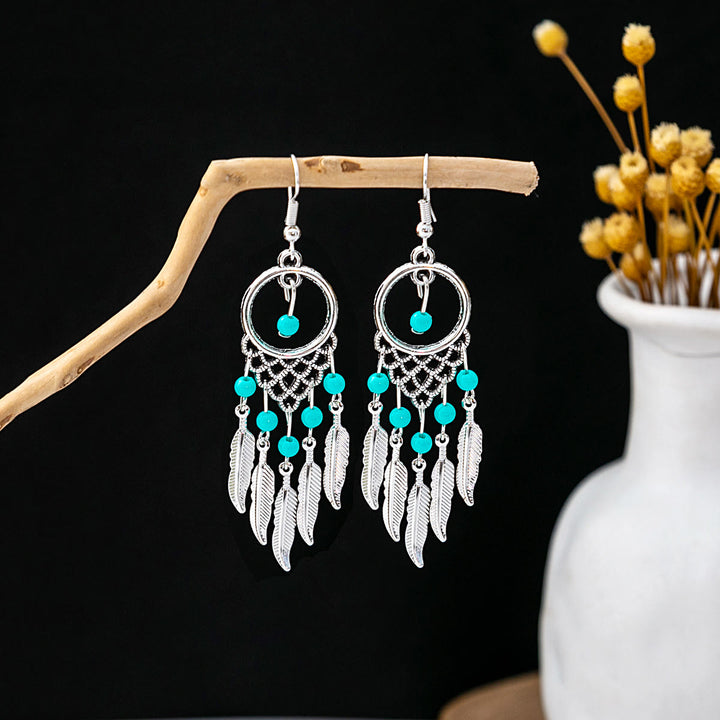 Pendientes Olivenorma estilo étnico retro con borlas bohemias de turquesa