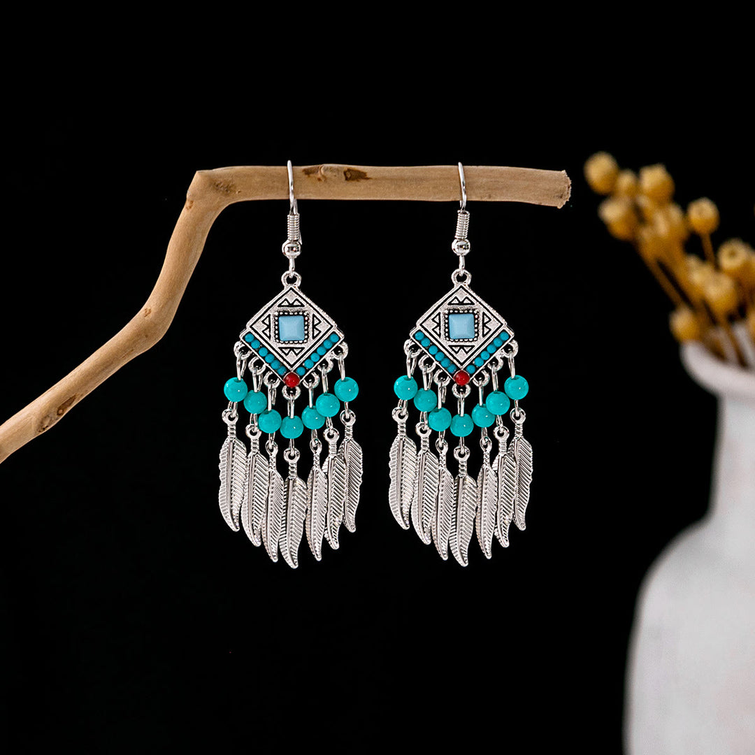 Pendientes Olivenorma estilo étnico retro con borlas bohemias de turquesa