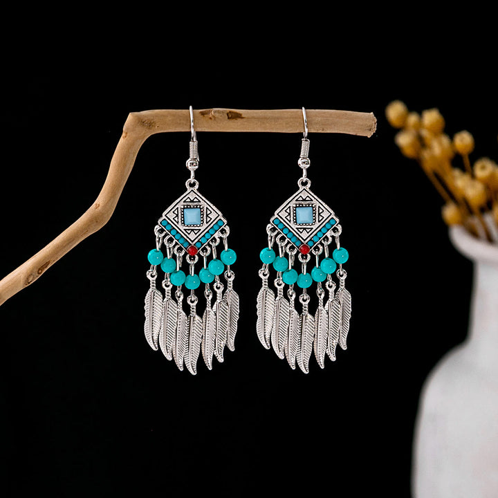 Pendientes Olivenorma estilo étnico retro con borlas bohemias de turquesa