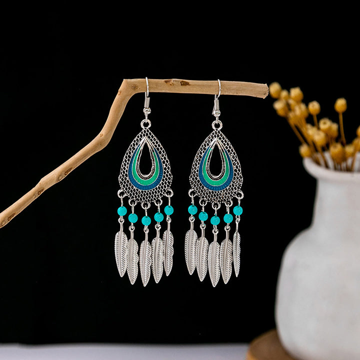 Pendientes Olivenorma estilo étnico retro con borlas bohemias de turquesa