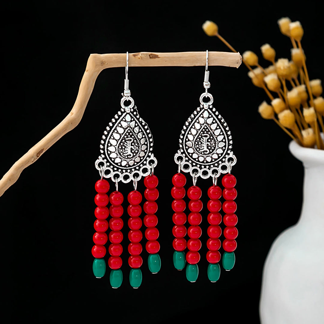 Pendientes Olivenorma estilo étnico retro con borlas bohemias de turquesa