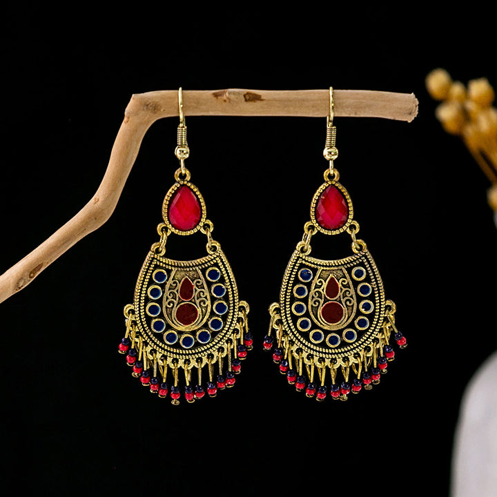 Pendientes Olivenorma estilo étnico retro con borlas bohemias de turquesa