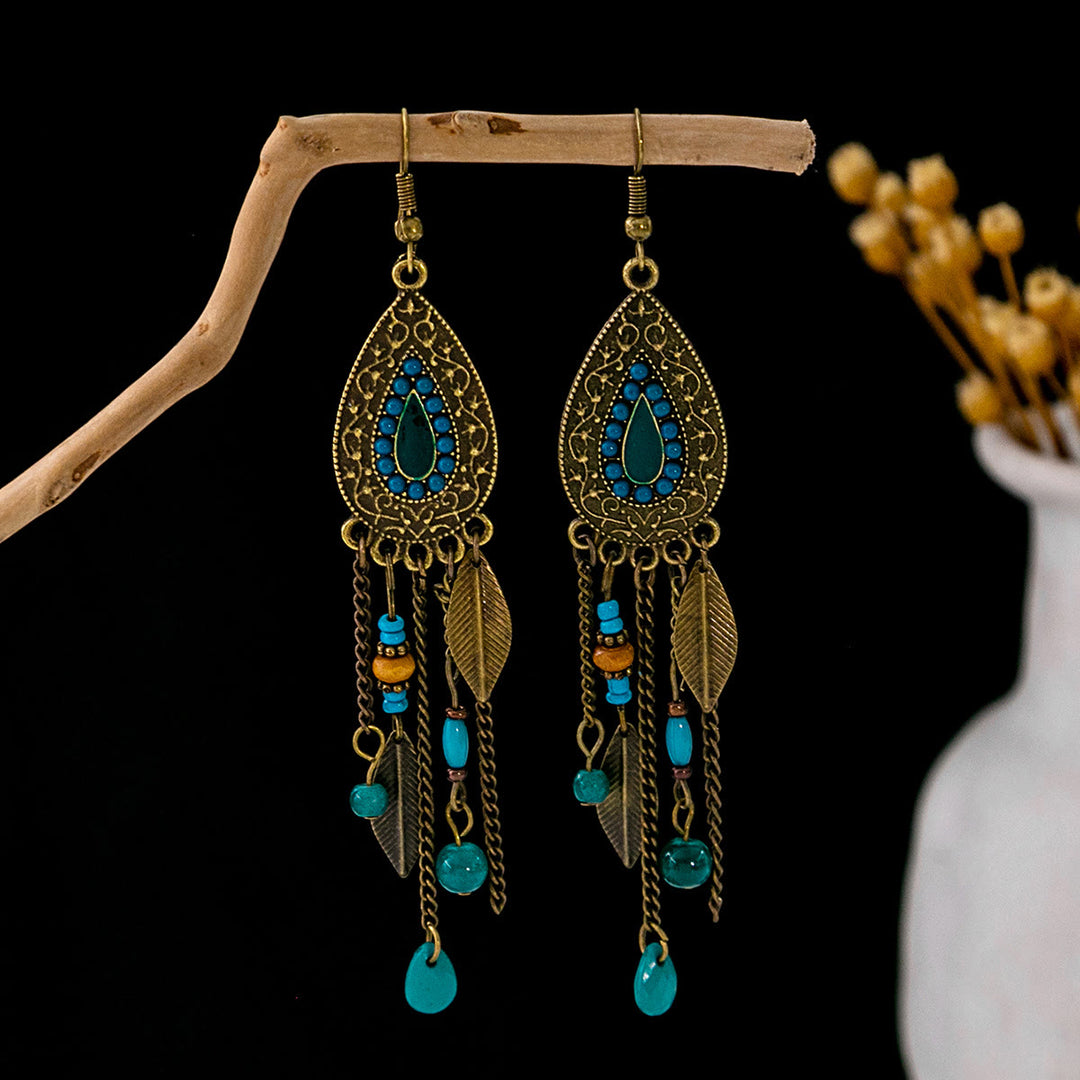 Pendientes Olivenorma estilo étnico retro con borlas bohemias de turquesa