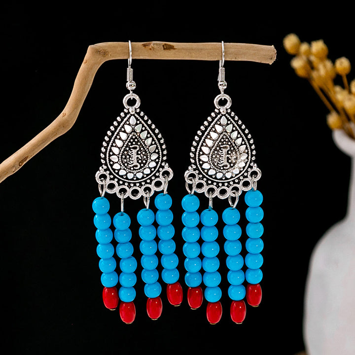 Pendientes Olivenorma estilo étnico retro con borlas bohemias de turquesa