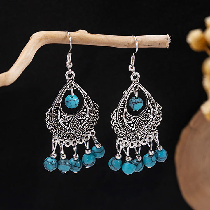 Pendientes Olivenorma estilo étnico retro con borlas bohemias de turquesa
