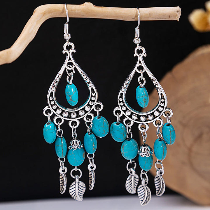 Pendientes Olivenorma estilo étnico retro con borlas bohemias de turquesa