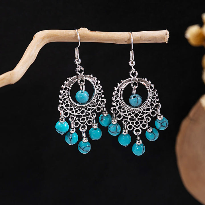 Pendientes Olivenorma estilo étnico retro con borlas bohemias de turquesa