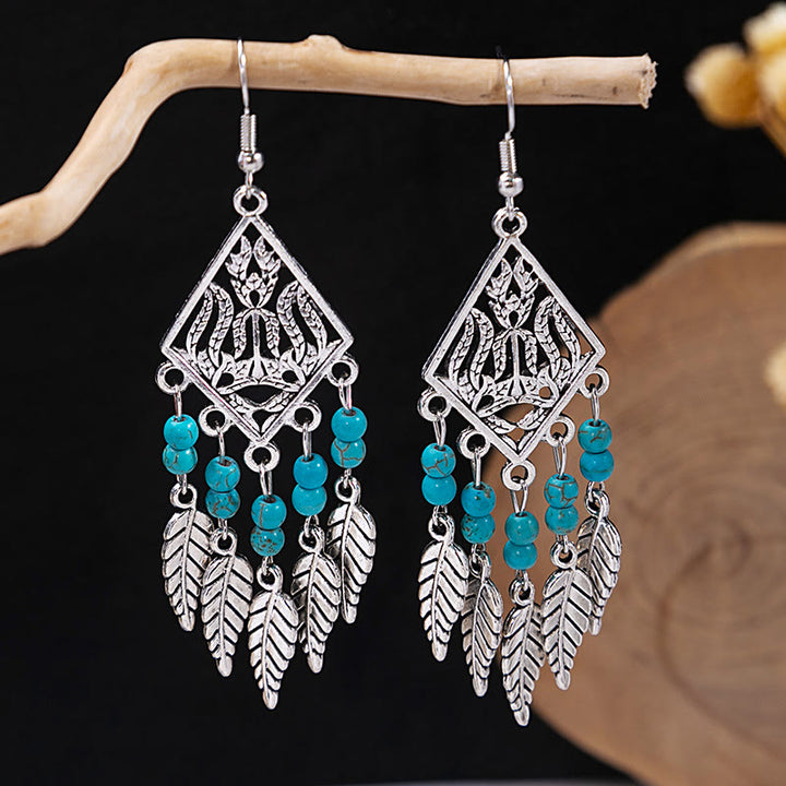 Pendientes Olivenorma estilo étnico retro con borlas bohemias de turquesa