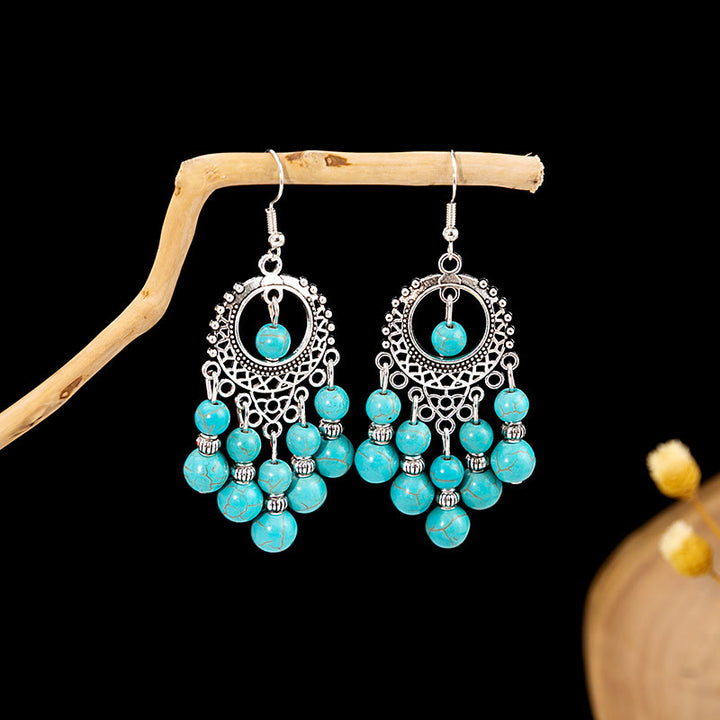 Pendientes Olivenorma estilo étnico retro con borlas bohemias de turquesa