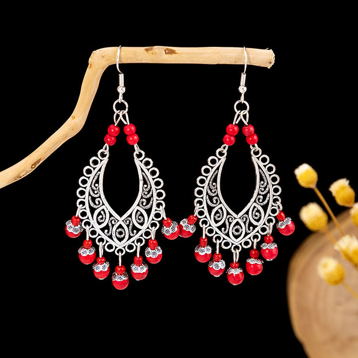 Pendientes Olivenorma estilo étnico retro con borlas bohemias de turquesa