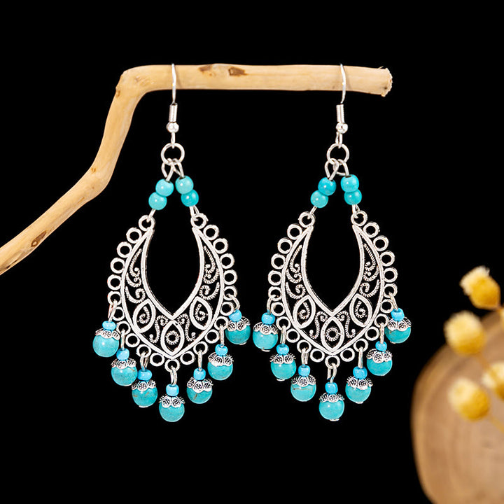 Pendientes Olivenorma estilo étnico retro con borlas bohemias de turquesa