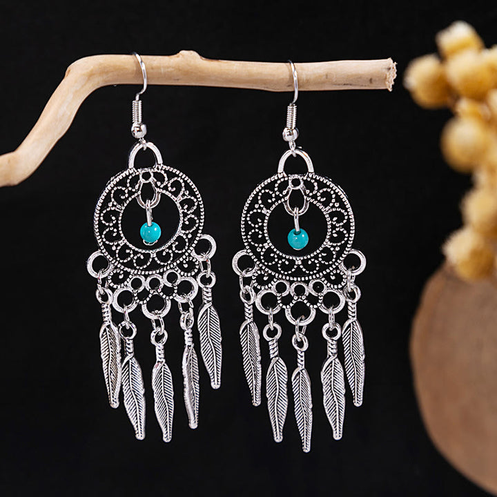 Pendientes Olivenorma estilo étnico retro con borlas bohemias de turquesa