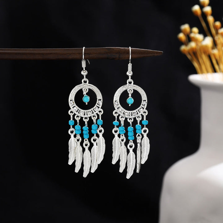 Pendientes Olivenorma estilo étnico retro con borlas bohemias de turquesa