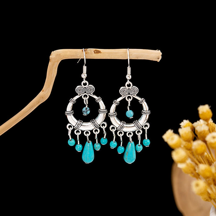 Pendientes Olivenorma estilo étnico retro con borlas bohemias de turquesa