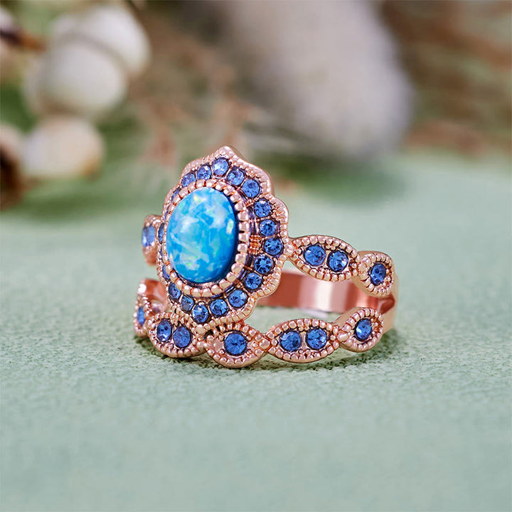 Juego de 2 anillos Olivenorma de oro rosa con zafiro y ópalo azul