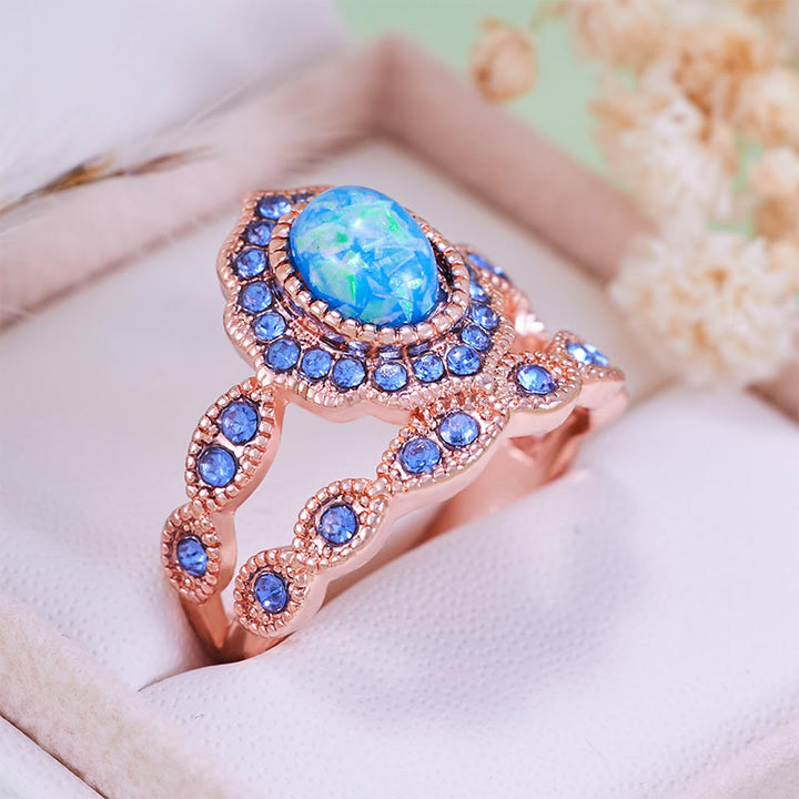 Juego de 2 anillos Olivenorma de oro rosa con zafiro y ópalo azul