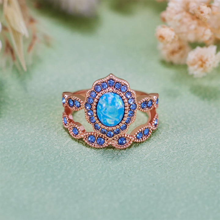 Juego de 2 anillos Olivenorma de oro rosa con zafiro y ópalo azul