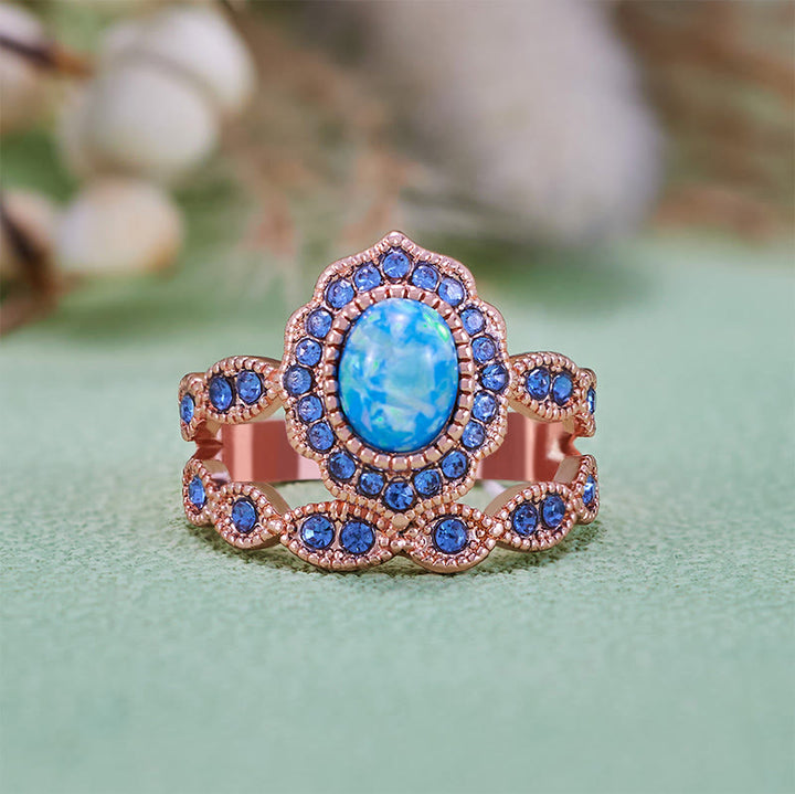 Juego de 2 anillos Olivenorma de oro rosa con zafiro y ópalo azul
