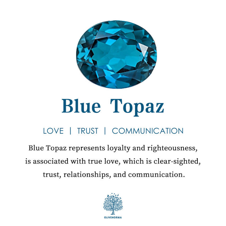 Anillo Olivenorma con corona en forma de lágrima y topacio azul