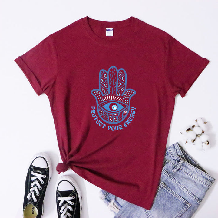 Camiseta con estampado de hamsa y ojo malvado de Olivenorma