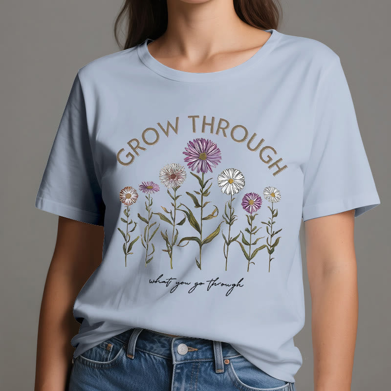Camiseta con estampado floral "Crece a través de" de Olivenorma