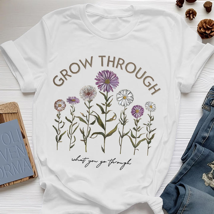Camiseta con estampado floral "Crece a través de" de Olivenorma