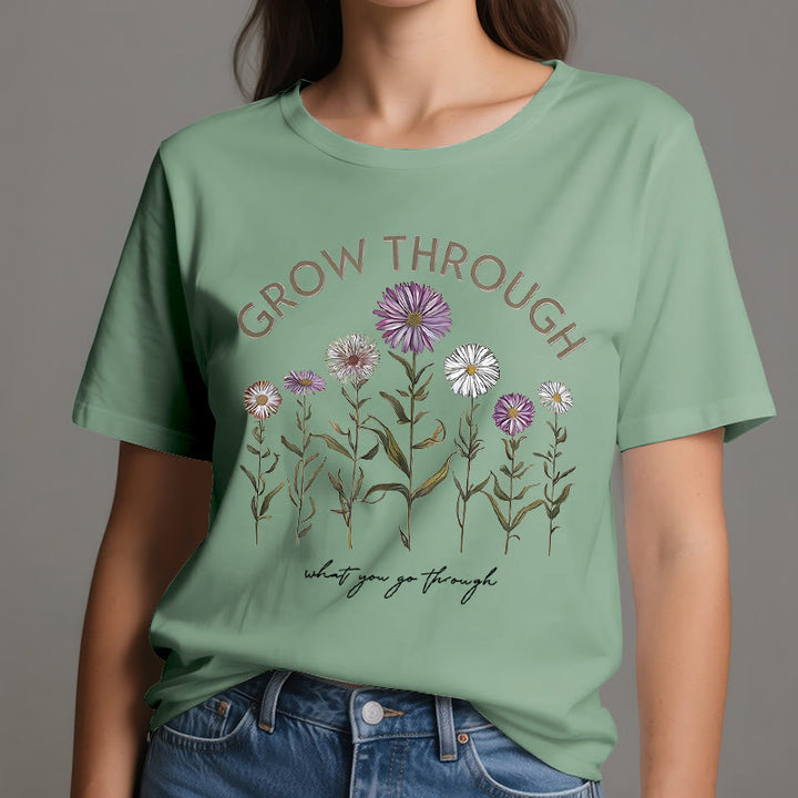 Camiseta con estampado floral "Crece a través de" de Olivenorma