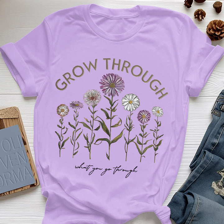 Camiseta con estampado floral "Crece a través de" de Olivenorma