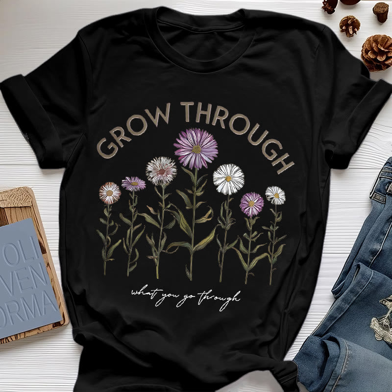 Camiseta con estampado floral "Crece a través de" de Olivenorma