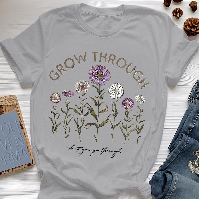 Camiseta con estampado floral "Crece a través de" de Olivenorma
